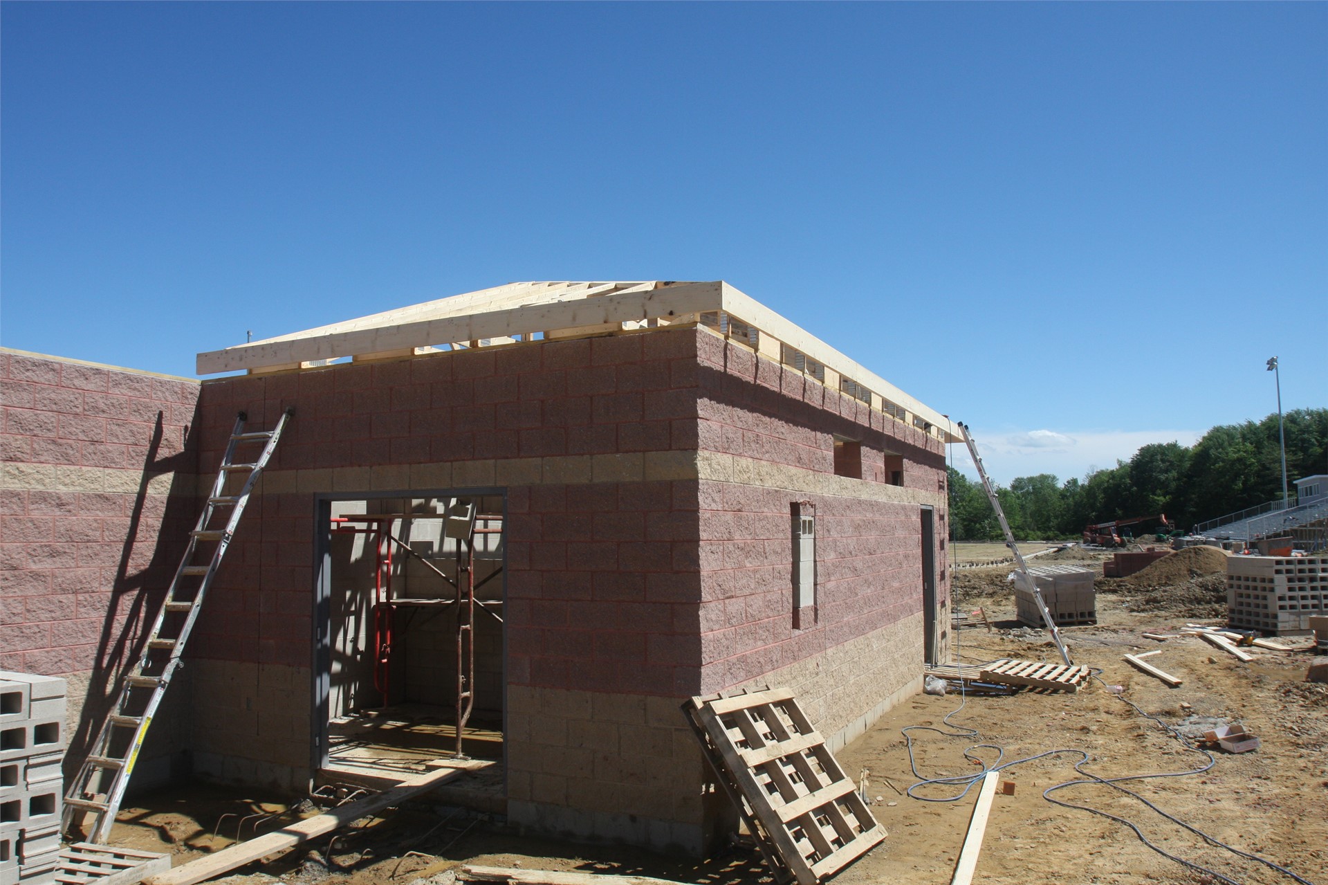 Roof being installed over the training room (home side)