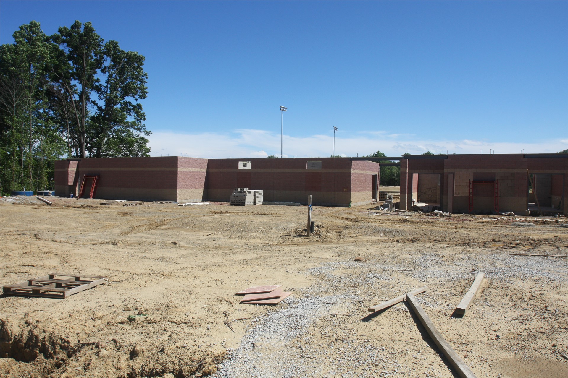 View of visitor side locker rooms/restrooms from parking lot