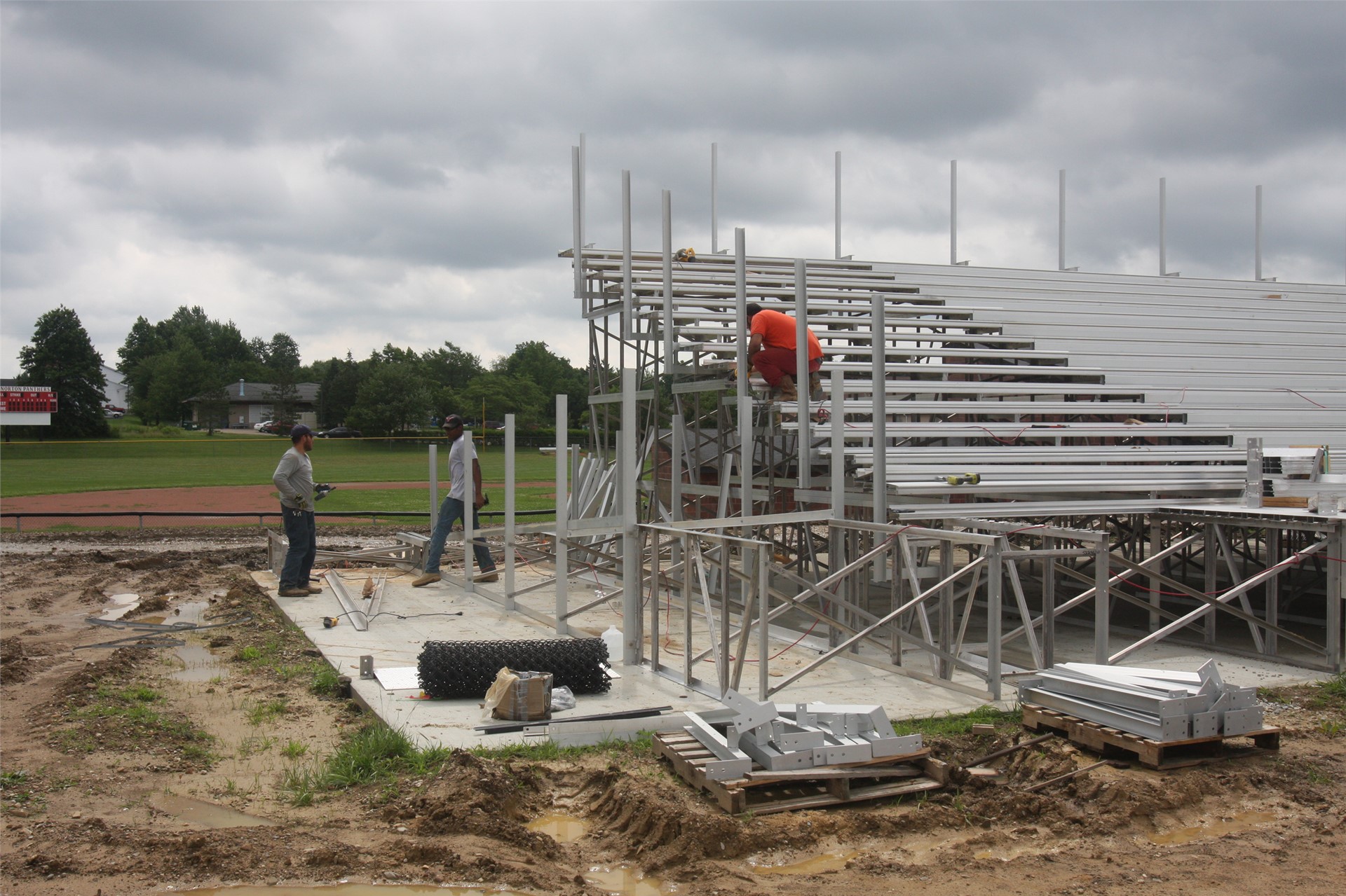 Crew workers assembling the visitor stands