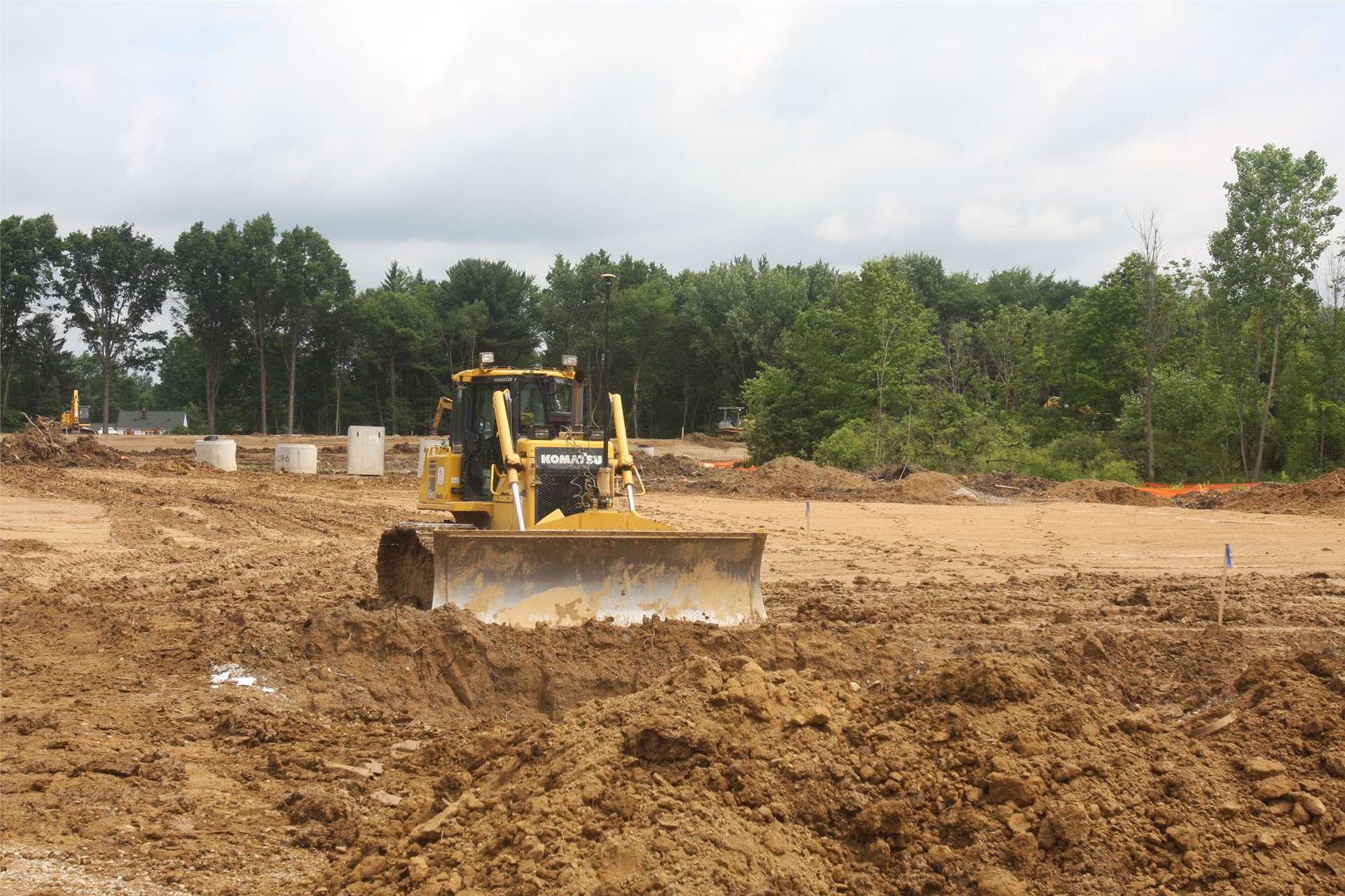 Construction of the pad for the parking lot between stadium and high school