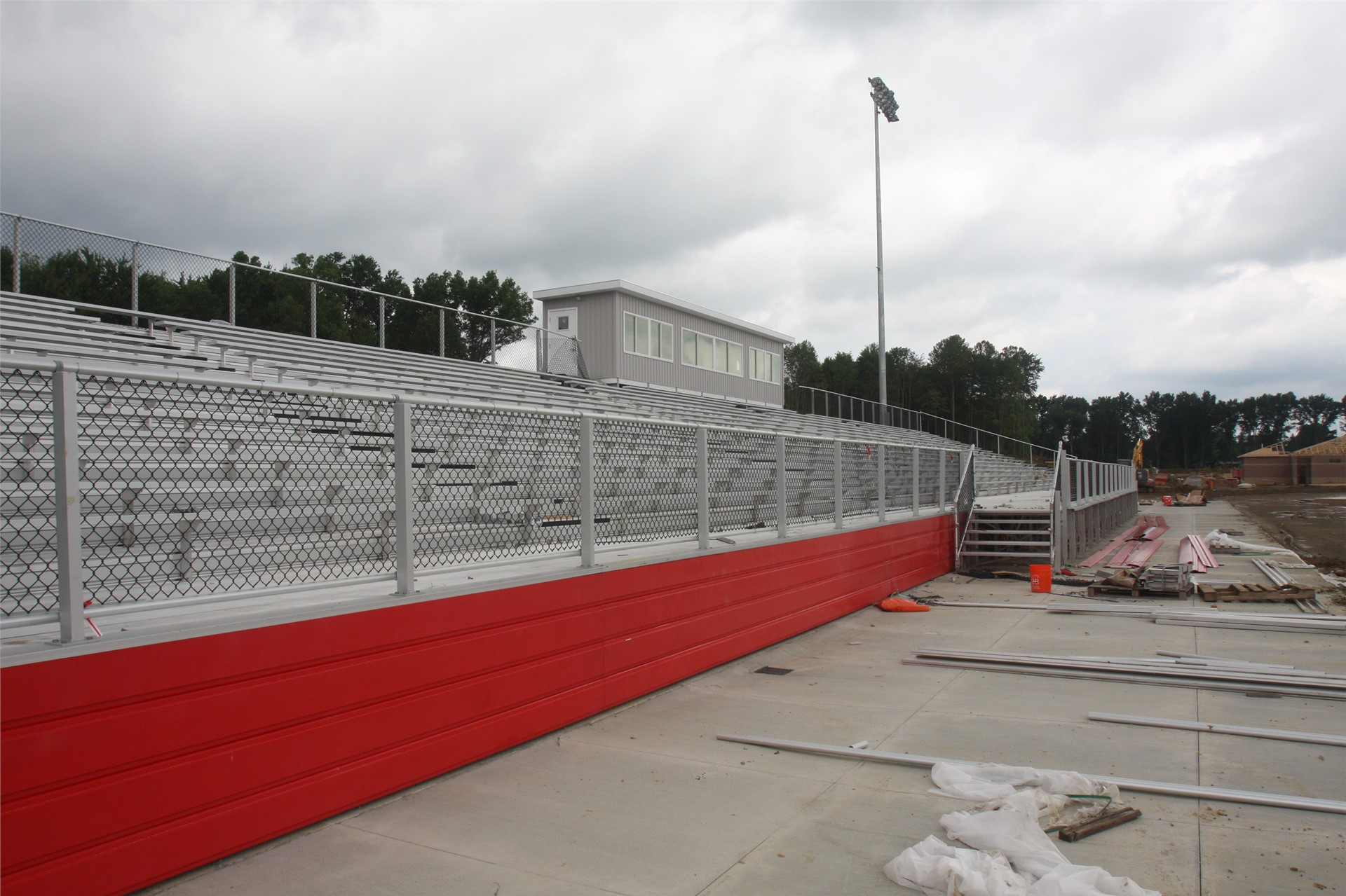 Home stands with red wall covering understructure