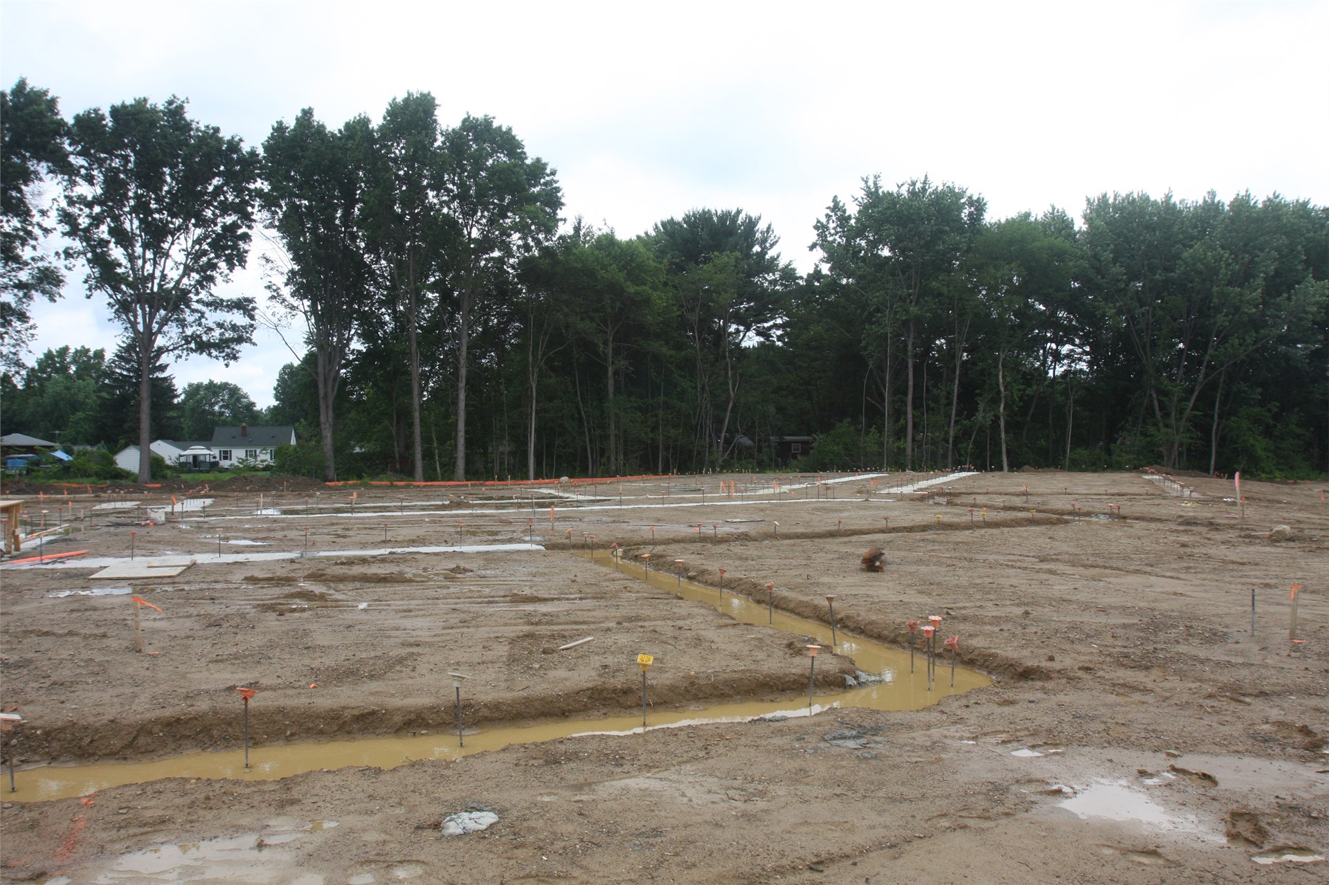 East side of the academic wing (footers underway)