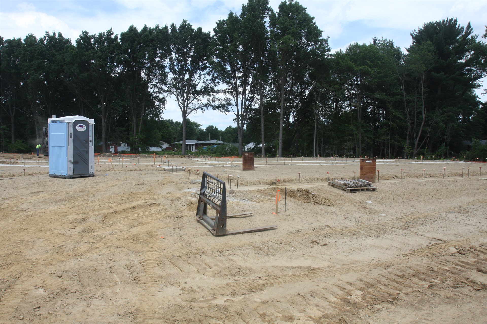Stakes outline the footers in the academic wing